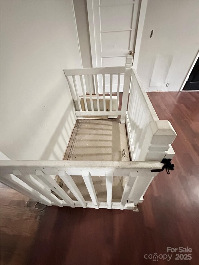 4207 Peach Orchard Rd, Granite Falls, NC 28630 - stairs featuring wood finished floors