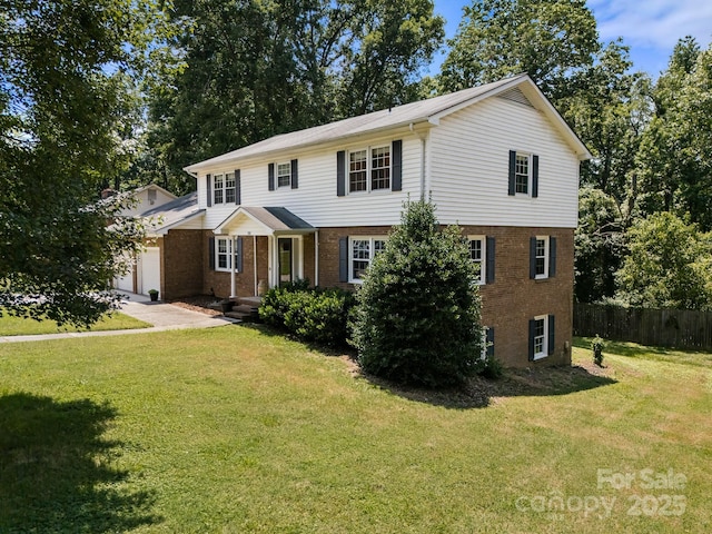 586 Crestside Dr SE, Concord, NC 28025 - view of front of home featuring brick siding and an attached garage