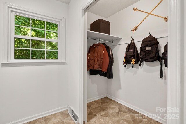 586 Crestside Dr SE, Concord, NC 28025 - mudroom with baseboards