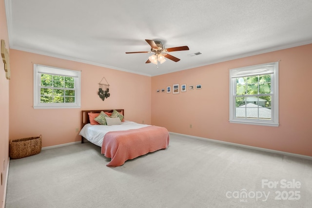 586 Crestside Dr SE, Concord, NC 28025 - bedroom with carpet flooring, multiple windows, ornamental molding, and ceiling fan