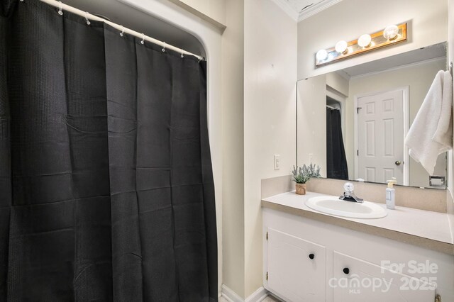 586 Crestside Dr SE, Concord, NC 28025 - bathroom featuring crown molding and vanity