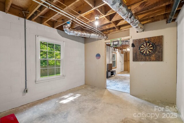 586 Crestside Dr SE, Concord, NC 28025 - below grade area featuring concrete block wall