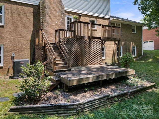 586 Crestside Dr SE, Concord, NC 28025 - back of house featuring brick siding, a wooden deck, stairway, and a lawn