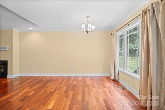1566 Mayfair Dr, Conover, NC 28613 - unfurnished dining area with ornamental molding, light wood-type flooring, healthy amount of natural light, a chandelier, and recessed lighting