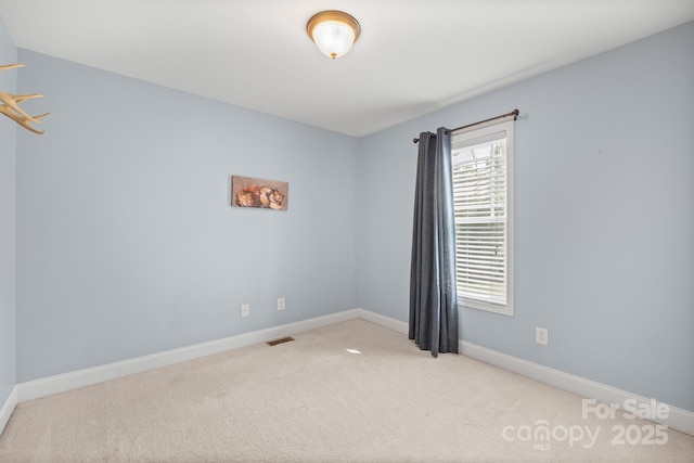 1566 Mayfair Dr, Conover, NC 28613 - unfurnished room featuring carpet flooring and baseboards