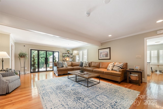 7119 Folger Dr, Charlotte, NC 28270 - living area featuring light wood-style flooring, ornamental molding, and recessed lighting