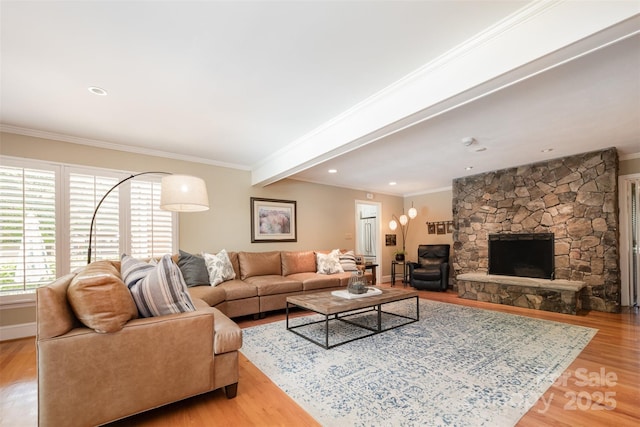 7119 Folger Dr, Charlotte, NC 28270 - living area featuring wood finished floors, a stone fireplace, ornamental molding, and recessed lighting