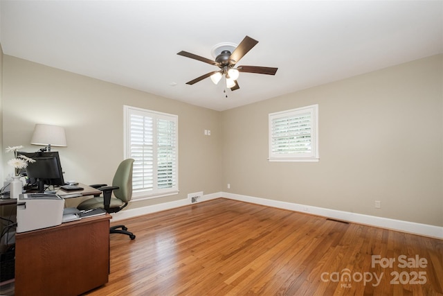 7119 Folger Dr, Charlotte, NC 28270 - office area featuring a ceiling fan, plenty of natural light, and light wood-style floors