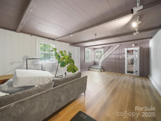 105 Edgewood Cir NE, Concord, NC 28025 - living room with a wooden ceiling with exposed beams, light wood-type flooring, stairway, and healthy amount of natural light