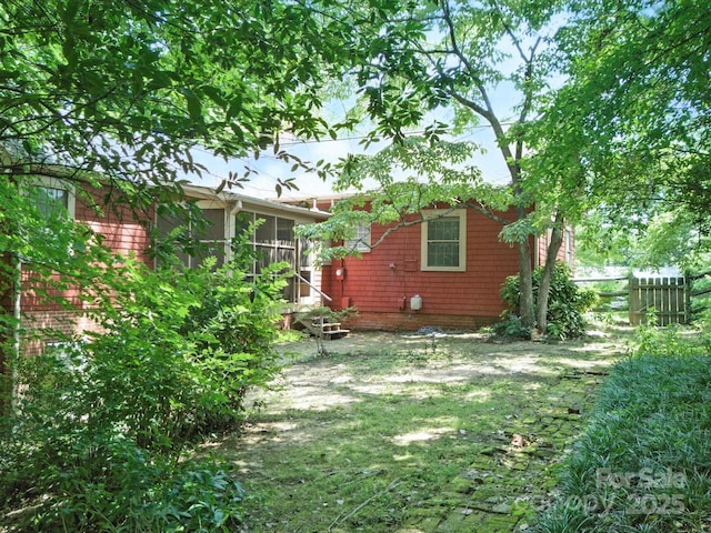 105 Edgewood Cir NE, Concord, NC 28025 - view of yard with a sunroom