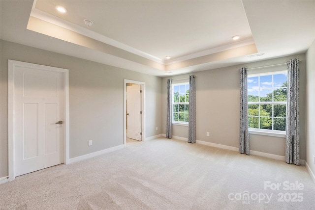 342 Cramerton Mills Parkway, Cramerton, NC 28032 - unfurnished bedroom featuring a raised ceiling, light colored carpet, crown molding, and recessed lighting