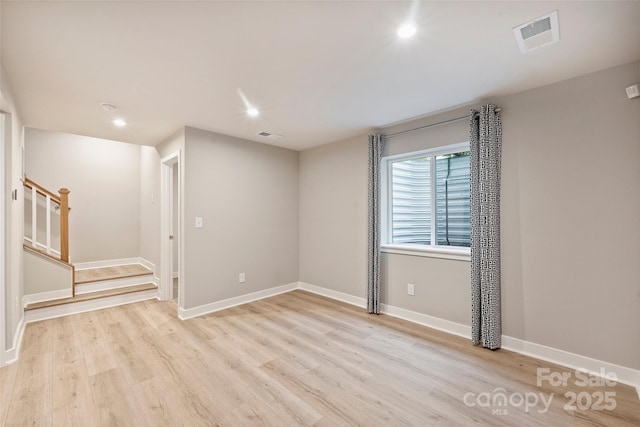 342 Cramerton Mills Parkway, Cramerton, NC 28032 - empty room with light wood-style flooring, recessed lighting, and stairs