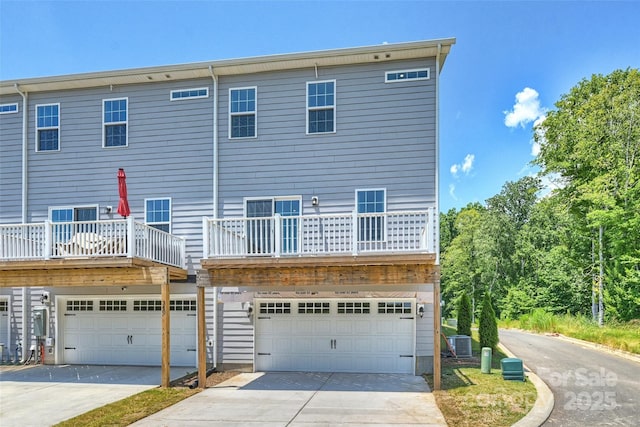 342 Cramerton Mills Parkway, Cramerton, NC 28032 - rear view of property with an attached garage and driveway