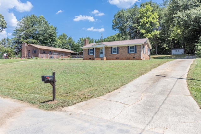 120 Lafayette Rd, Stanley, NC 28164 - ranch-style house featuring crawl space, brick siding, a chimney, driveway, and a front lawn