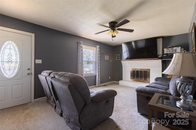 120 Lafayette Rd, Stanley, NC 28164 - living area with a ceiling fan, carpet floors, a textured ceiling, and a brick fireplace