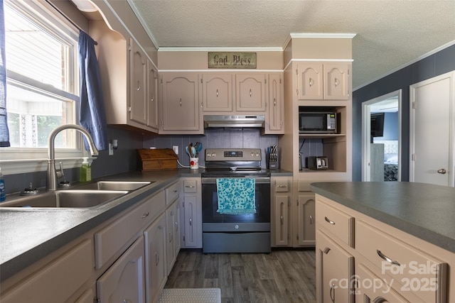 120 Lafayette Rd, Stanley, NC 28164 - kitchen featuring stainless steel appliances, under cabinet range hood, a textured ceiling, crown molding, and dark wood-type flooring