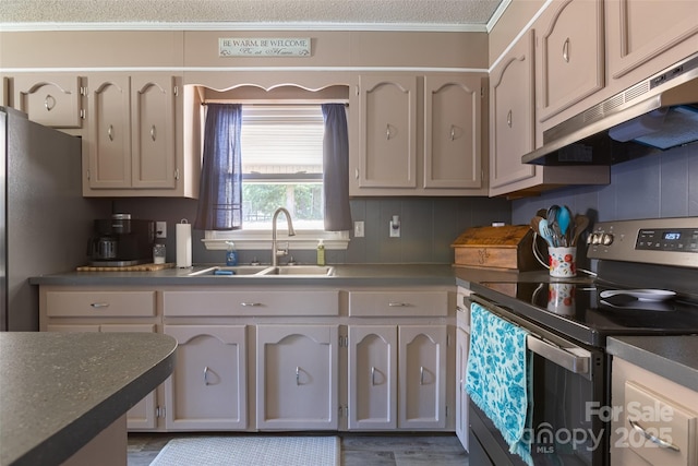 120 Lafayette Rd, Stanley, NC 28164 - kitchen with appliances with stainless steel finishes, under cabinet range hood, crown molding, and dark countertops