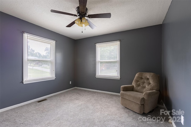 120 Lafayette Rd, Stanley, NC 28164 - unfurnished room with carpet, a textured ceiling, and a ceiling fan
