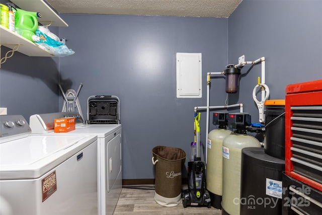 120 Lafayette Rd, Stanley, NC 28164 - laundry room featuring washer and dryer, electric panel, and wood finished floors