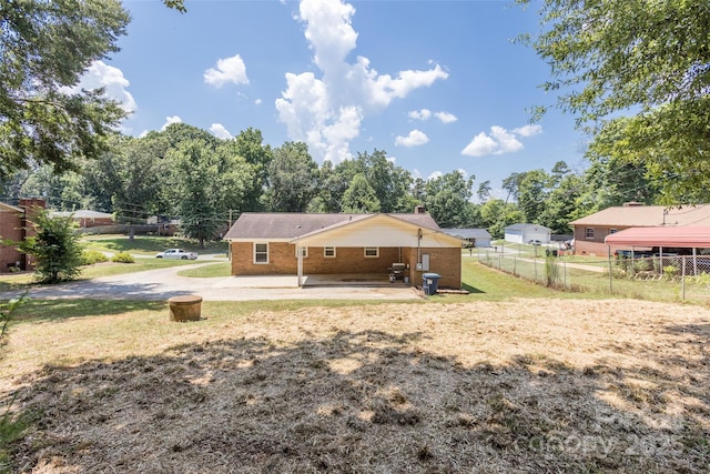 120 Lafayette Rd, Stanley, NC 28164 - rear view of property with brick siding and a patio area