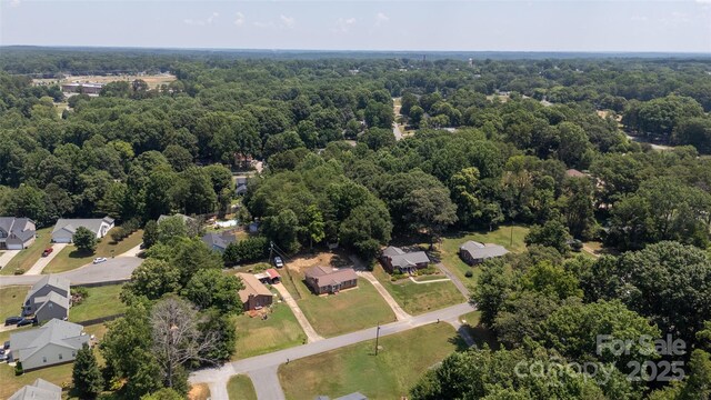 120 Lafayette Rd, Stanley, NC 28164 - aerial view of property and surrounding area with a forest and nearby suburban area
