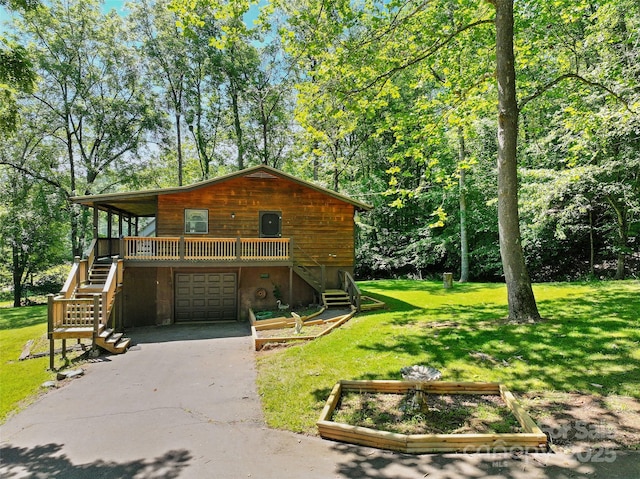 250 Turkey Pen Rd, Franklin, NC 28734 - rustic home featuring stairs, driveway, a front lawn, and an attached garage