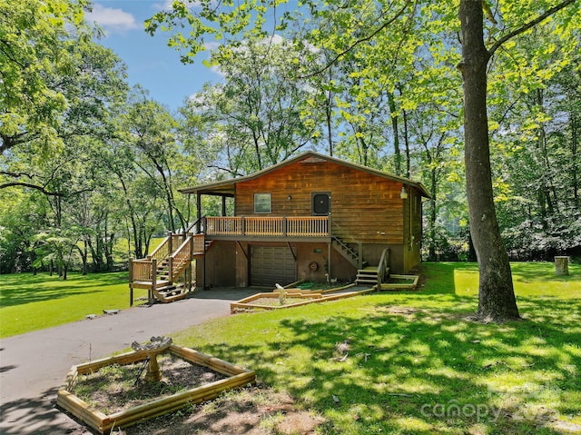 250 Turkey Pen Rd, Franklin, NC 28734 - back of house featuring stairway, asphalt driveway, a garage, and a lawn