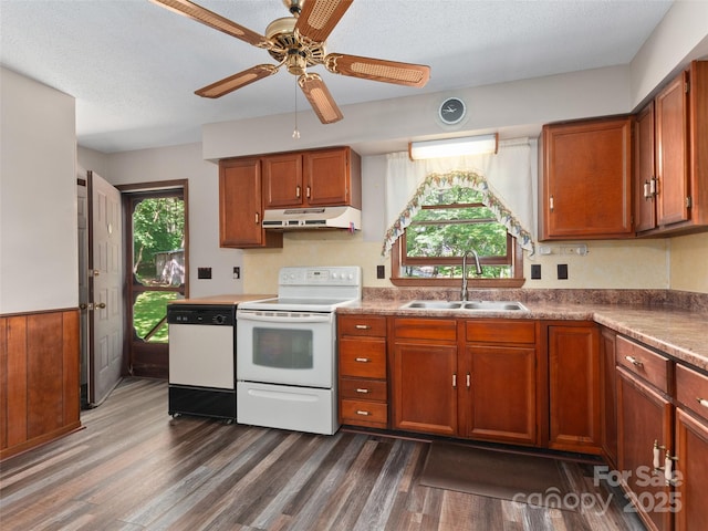 250 Turkey Pen Rd, Franklin, NC 28734 - kitchen with under cabinet range hood, white appliances, dark wood-type flooring, brown cabinets, and ceiling fan