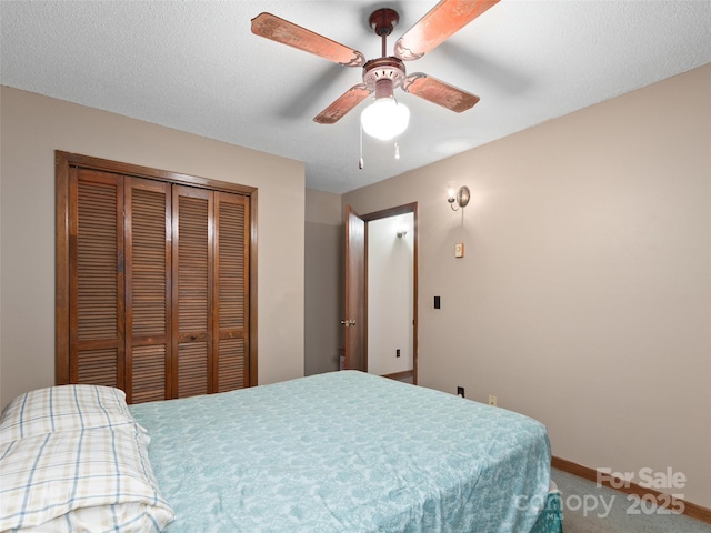 250 Turkey Pen Rd, Franklin, NC 28734 - carpeted bedroom featuring a closet and a ceiling fan