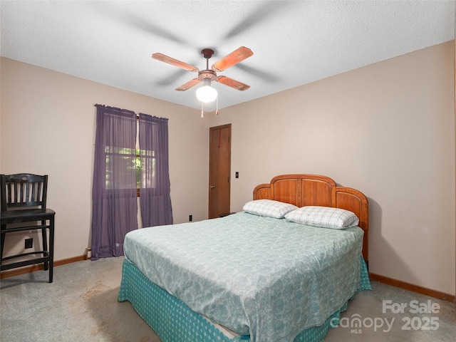 250 Turkey Pen Rd, Franklin, NC 28734 - bedroom featuring light carpet and a ceiling fan