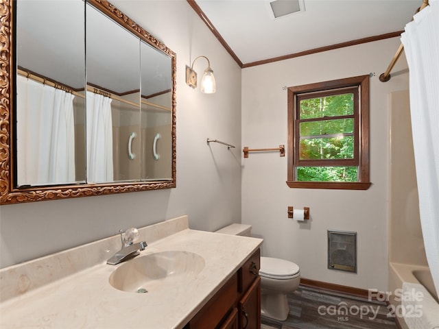 250 Turkey Pen Rd, Franklin, NC 28734 - bathroom with heating unit, vanity, ornamental molding, wood finished floors, and shower / bath combo with shower curtain