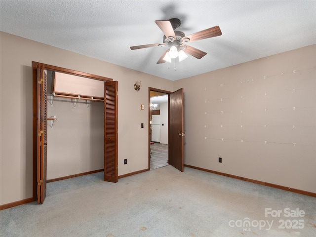 250 Turkey Pen Rd, Franklin, NC 28734 - unfurnished bedroom with carpet, a closet, and ceiling fan