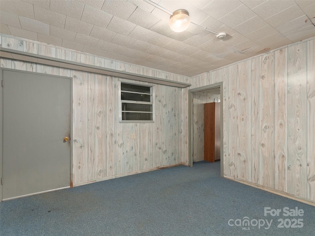 250 Turkey Pen Rd, Franklin, NC 28734 - carpeted spare room with wooden walls and a smoke detector