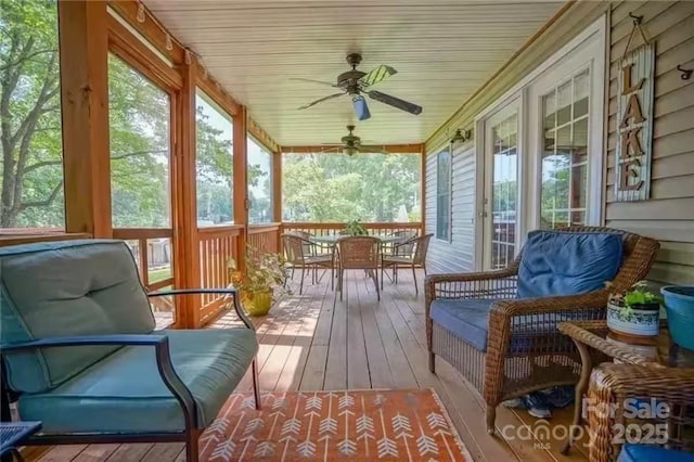 696 Springwood Dr, Mount Gilead, NC 27306 - sunroom / solarium featuring outdoor dining area, ceiling fan, and healthy amount of natural light