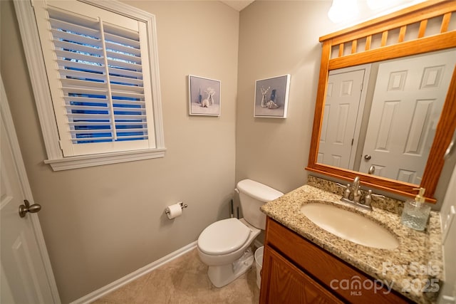 696 Springwood Dr, Mount Gilead, NC 27306 - half bathroom featuring vanity and tile patterned floors
