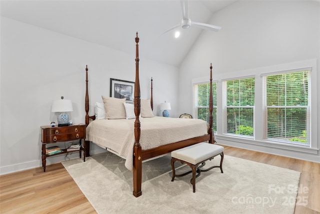 2866 Backwoods Trl, Denver, NC 28037 - bedroom with high vaulted ceiling, light wood-style floors, and a ceiling fan