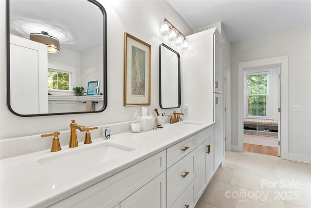 2866 Backwoods Trl, Denver, NC 28037 - full bath with double vanity and tile patterned flooring