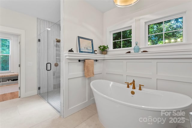 2866 Backwoods Trl, Denver, NC 28037 - full bath featuring plenty of natural light, a soaking tub, and a shower stall