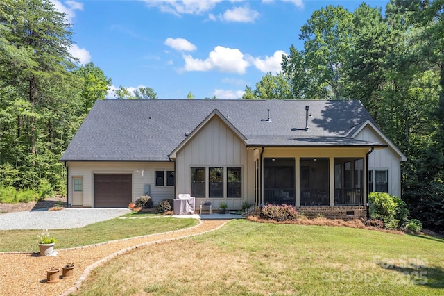 2866 Backwoods Trl, Denver, NC 28037 - rear view of house featuring an attached garage, board and batten siding, a sunroom, gravel driveway, and roof with shingles