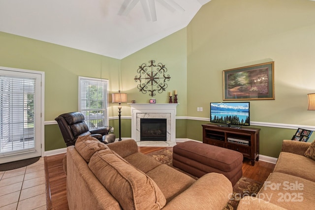 3865 Willow Grove Ln, Concord, NC 28025 - living area with wood finished floors, a fireplace, high vaulted ceiling, and a ceiling fan