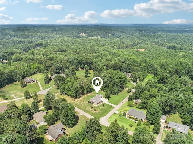 3865 Willow Grove Ln, Concord, NC 28025 - aerial view of property and surrounding area featuring a heavily wooded area