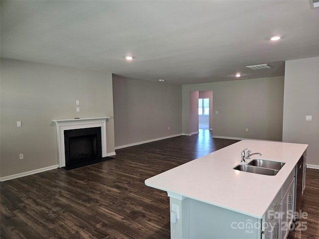 368 Saddlebred Ln, Locust, NC 28097 - kitchen featuring dark wood-style flooring, light countertops, open floor plan, and recessed lighting