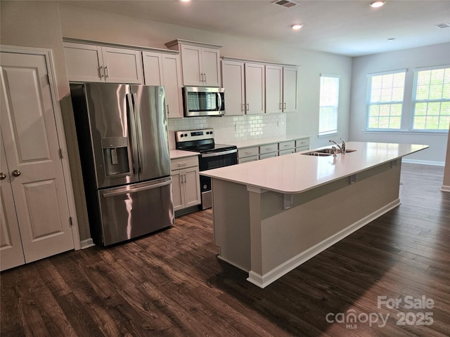 368 Saddlebred Ln, Locust, NC 28097 - kitchen with appliances with stainless steel finishes, dark wood-style floors, backsplash, and recessed lighting