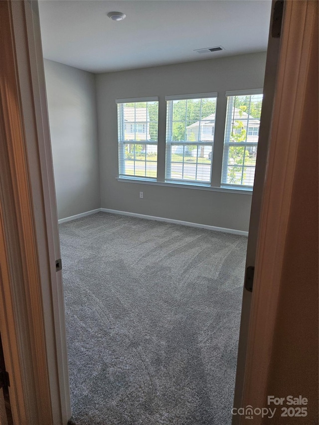 368 Saddlebred Ln, Locust, NC 28097 - spare room with carpet flooring and baseboards