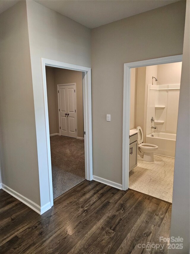 368 Saddlebred Ln, Locust, NC 28097 - hallway with dark wood-style floors