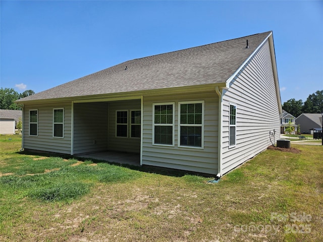 368 Saddlebred Ln, Locust, NC 28097 - rear view of house with a yard, a patio, and a shingled roof