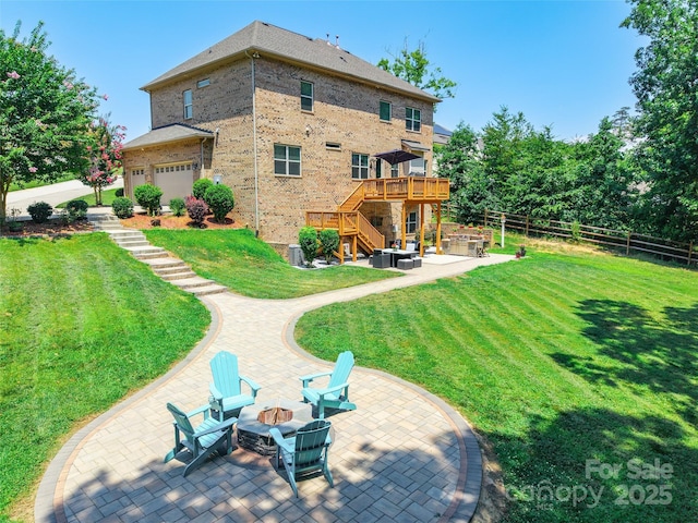 461 Swift Creek Cv, Clover, SC 29710 - rear view of house with an outdoor fire pit, stairs, a deck, a patio, and brick siding