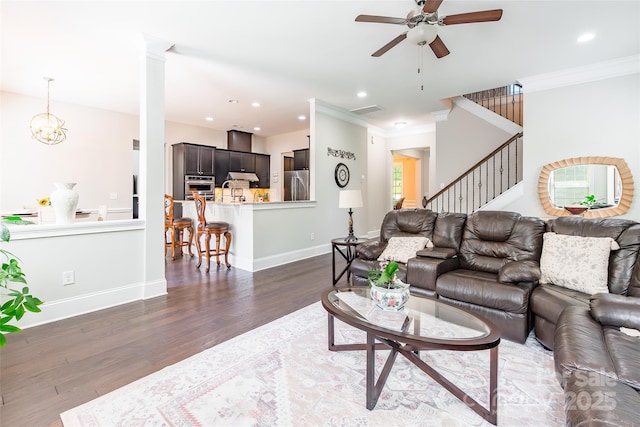 461 Swift Creek Cv, Clover, SC 29710 - living room featuring a ceiling fan, wood finished floors, stairs, recessed lighting, and ornamental molding