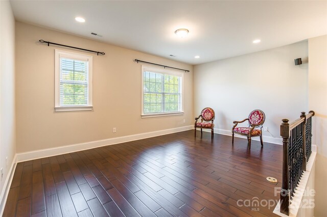 461 Swift Creek Cv, Clover, SC 29710 - living area featuring healthy amount of natural light, dark wood-style flooring, an upstairs landing, and recessed lighting
