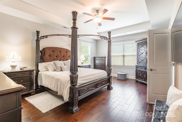 461 Swift Creek Cv, Clover, SC 29710 - bedroom with dark wood-style floors, a raised ceiling, and ceiling fan